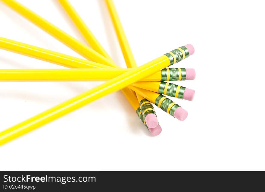 Spiral of Wooden Pencils on White. Spiral of Wooden Pencils on White