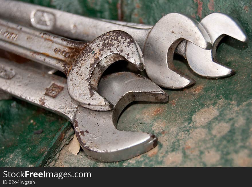 Detail of four metal wrenches. Detail of four metal wrenches