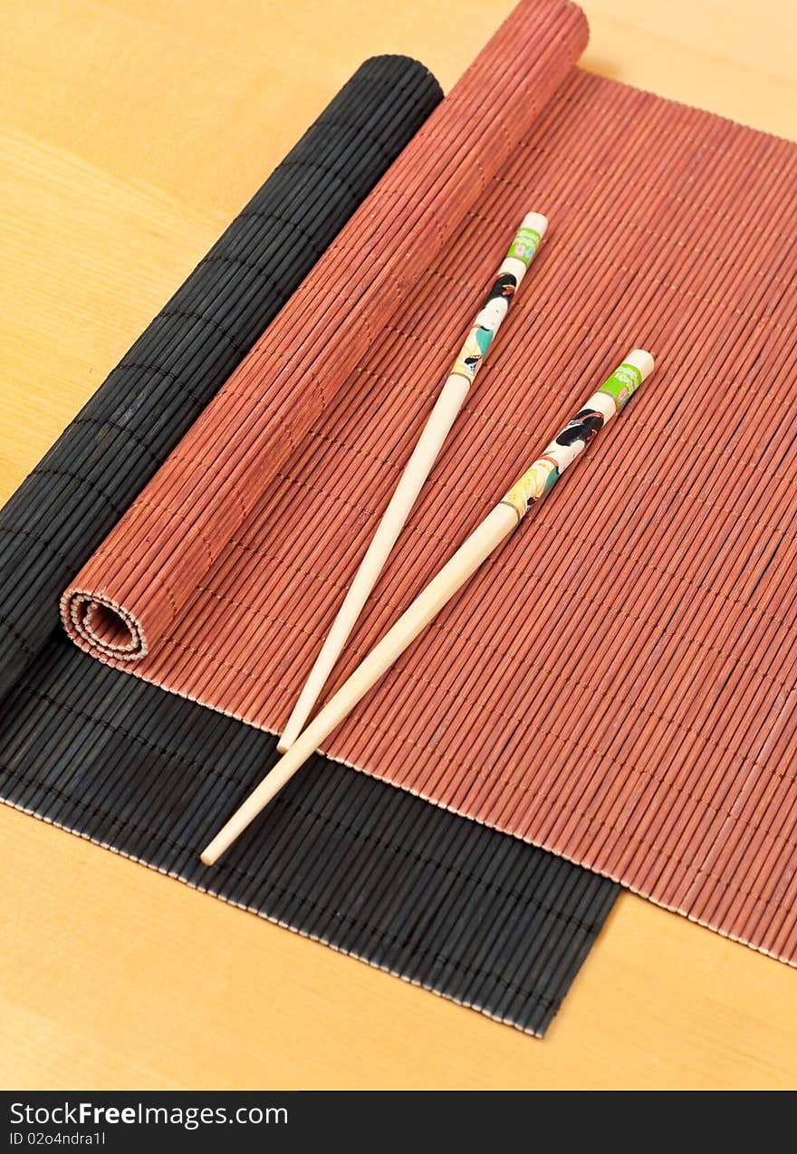 Oriental Chop Sticks and Bamboo Dining Mats for asian cuisine concepts. Oriental Chop Sticks and Bamboo Dining Mats for asian cuisine concepts