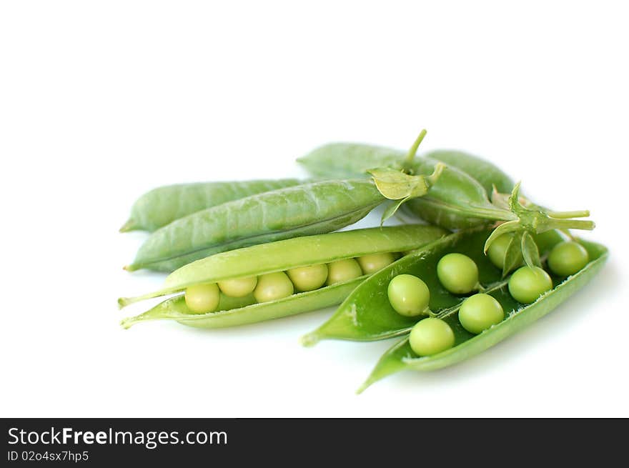 Fresh green pea-pod on white background. Fresh green pea-pod on white background