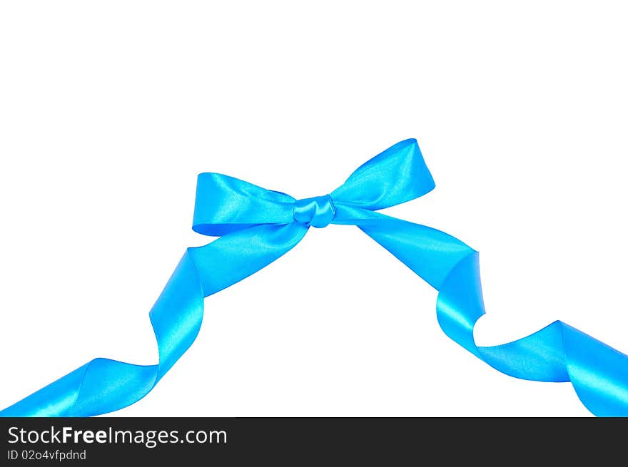 Isolated blue bow with a ribbon on white