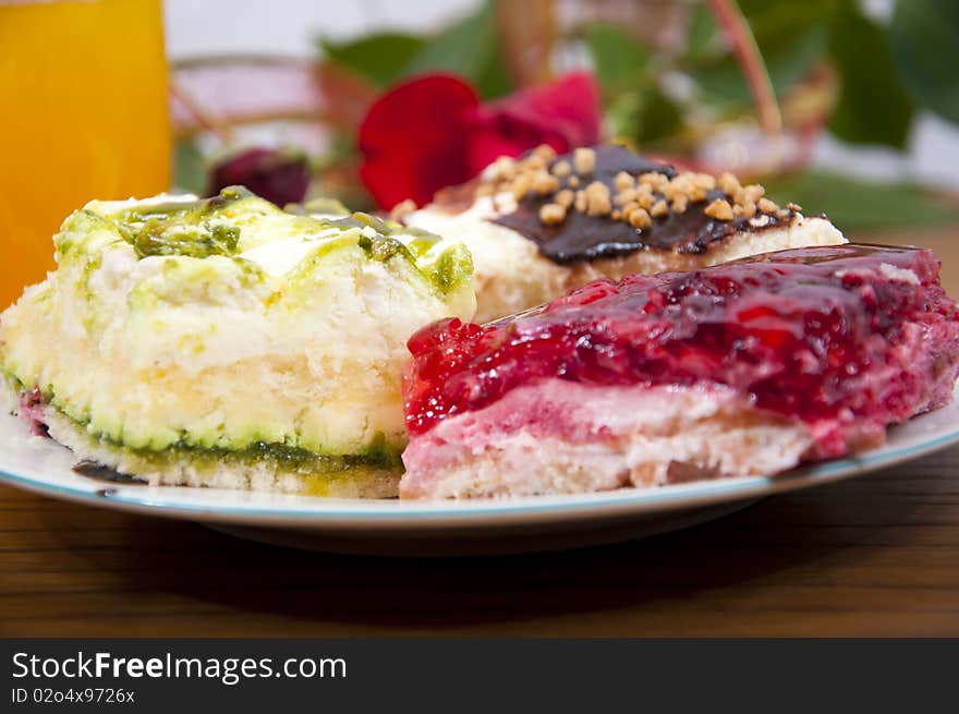 Sweet desserts with strawberry and chocolate on white plate. Sweet desserts with strawberry and chocolate on white plate