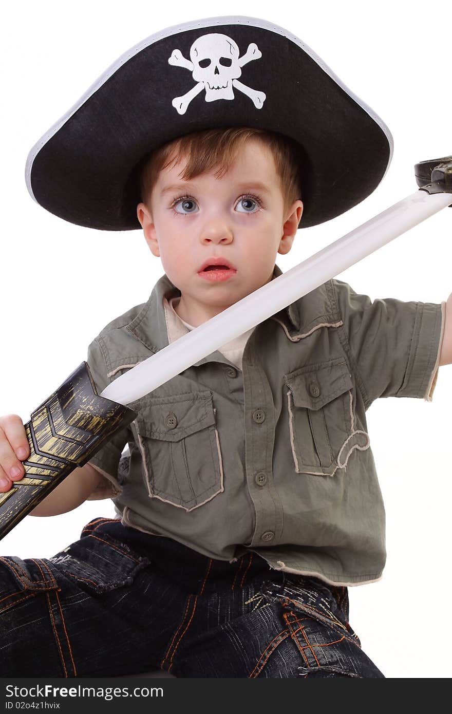 Young boy dressed as a pirate.