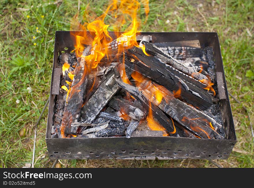 Preparing barbecue fire