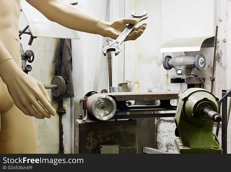 Mannequin in a blacksmith's workshop