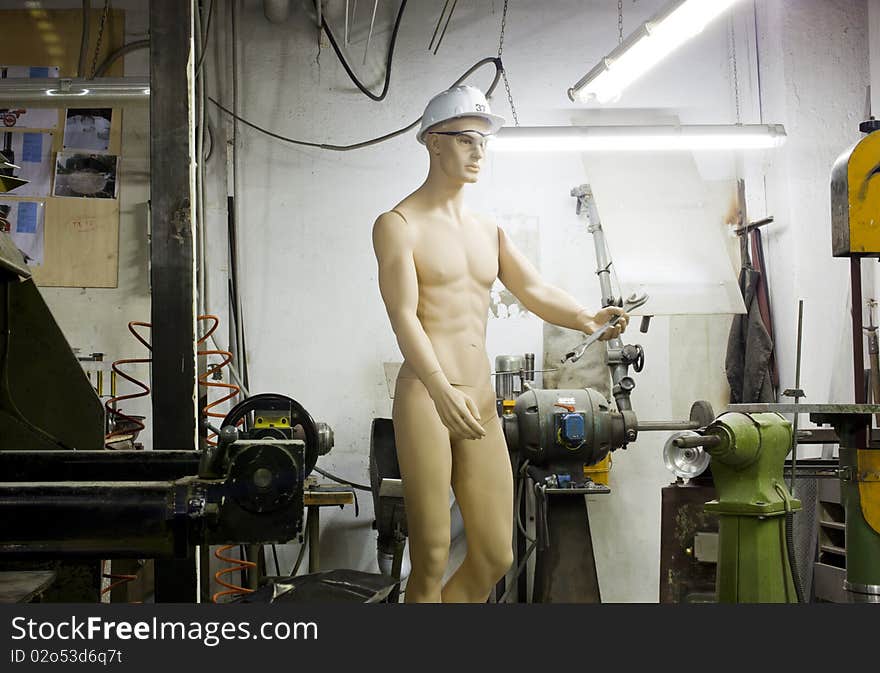 Mannequin in a blacksmith's workshop