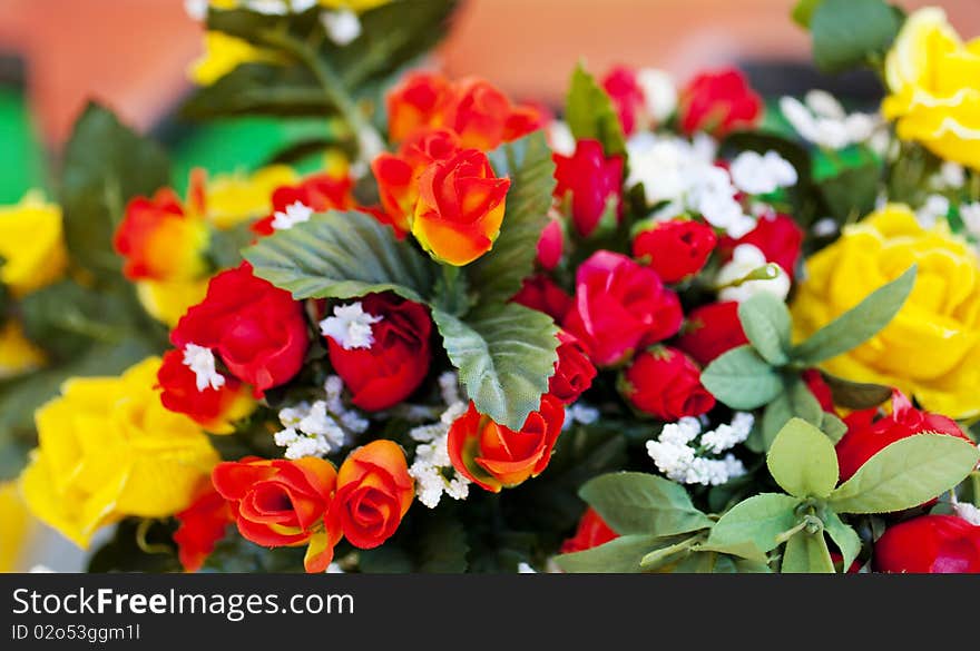 Bouquet of yellow, red and orange roses