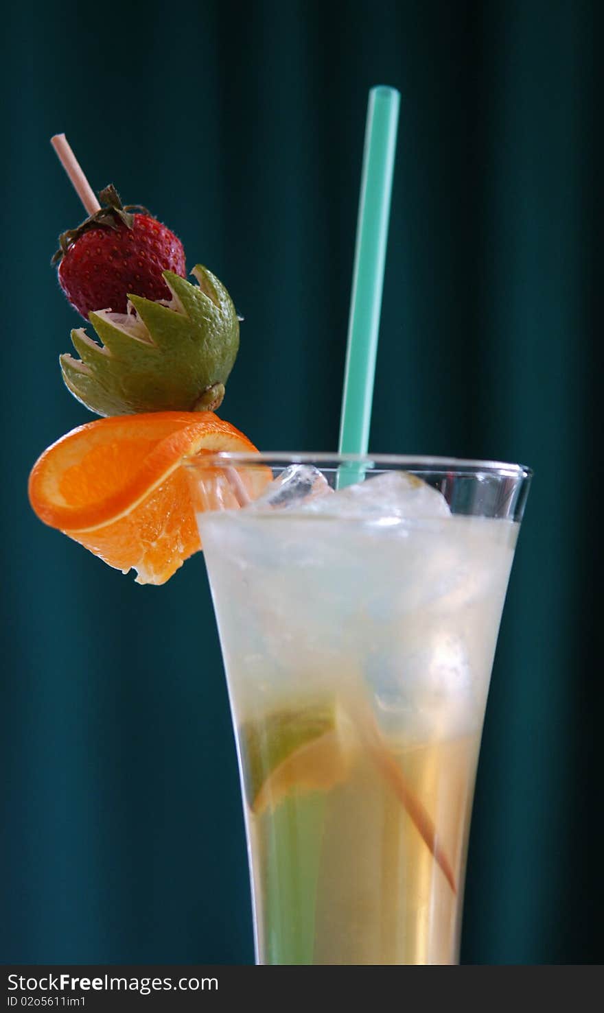 Coctail with ice and straw in glass. Coctail with ice and straw in glass