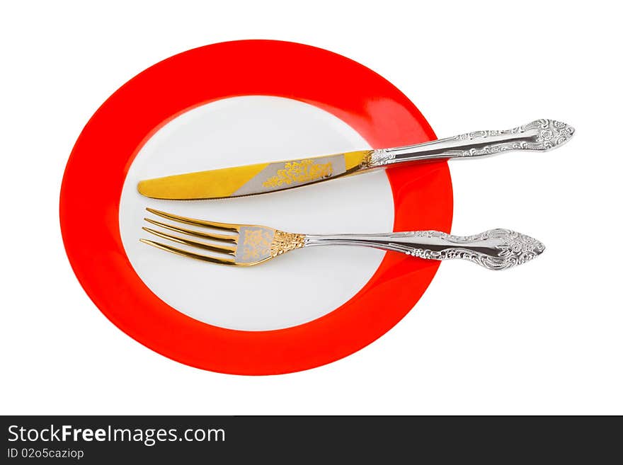 Plate, knife and fork isolated on white background