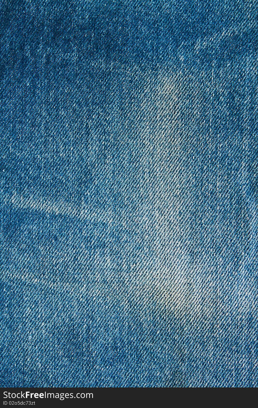 Texture of blue modern jeans with pocket, can be used as a background. Texture of blue modern jeans with pocket, can be used as a background