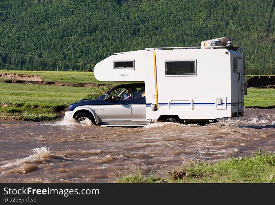 Car crossing through the river. Car crossing through the river