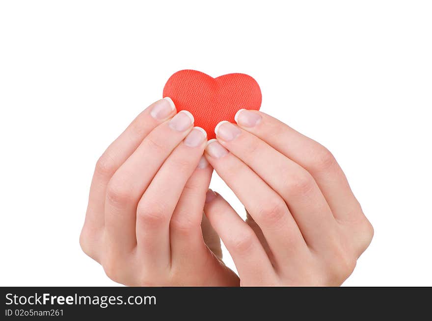 Heart in female hand. Isolated on white. Heart in female hand. Isolated on white.