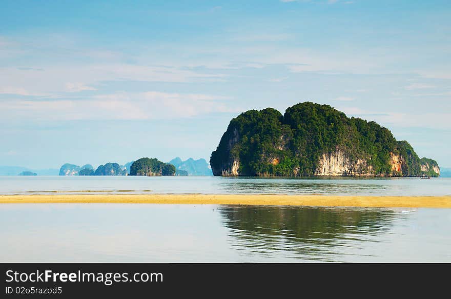 High cliffs on the tropical island. Exotic tropical landscape.