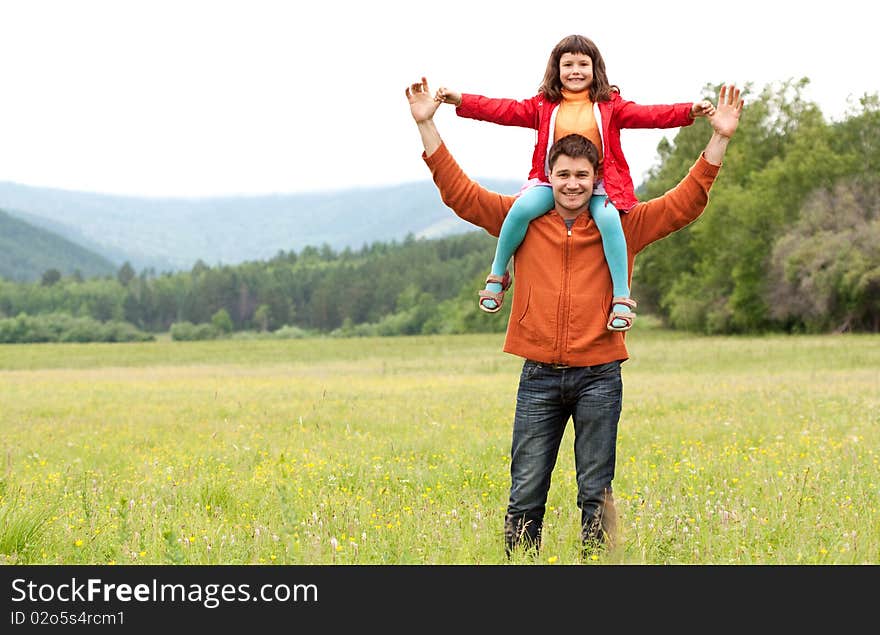 The father with the daughter on the nature. The father with the daughter on the nature