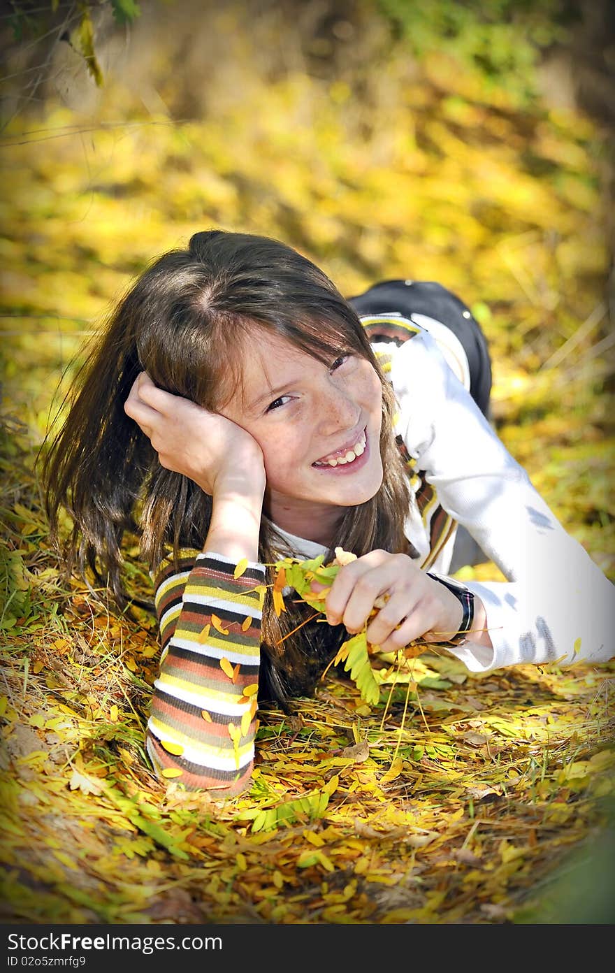 Portrait of a smiling girl in summer time