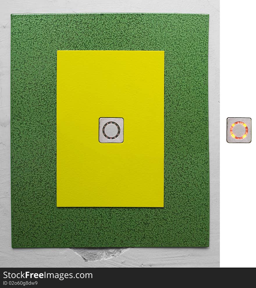 Lift button on grunge grey wall