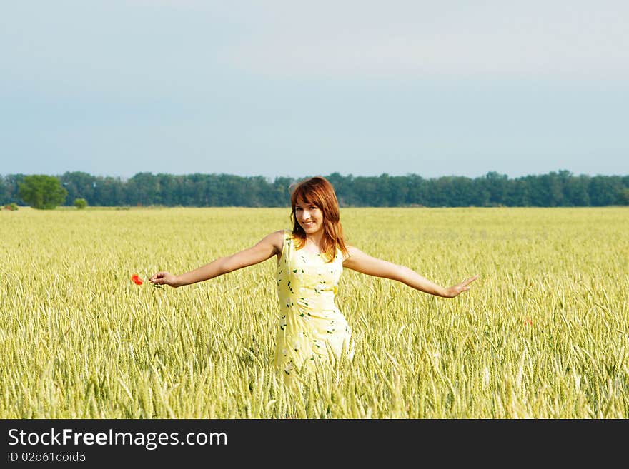 Happy girl smiling in field. Happy girl smiling in field