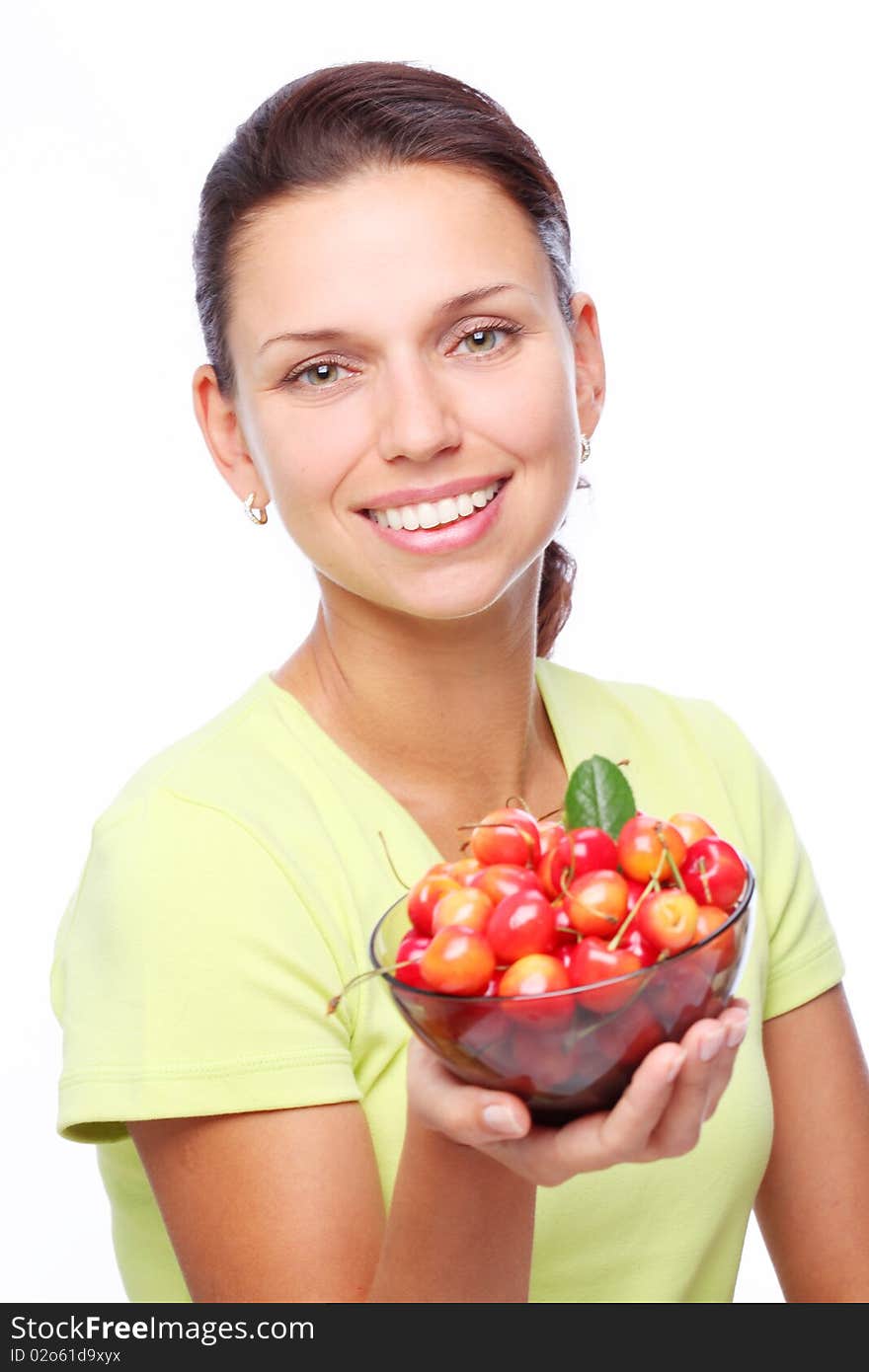 Smiling young woman with bowl full of ripe cherries in her hands. Smiling young woman with bowl full of ripe cherries in her hands.