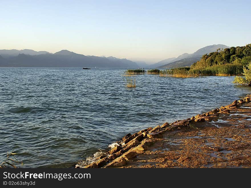 Lake in sunset, Italy, Europe. Lake in sunset, Italy, Europe