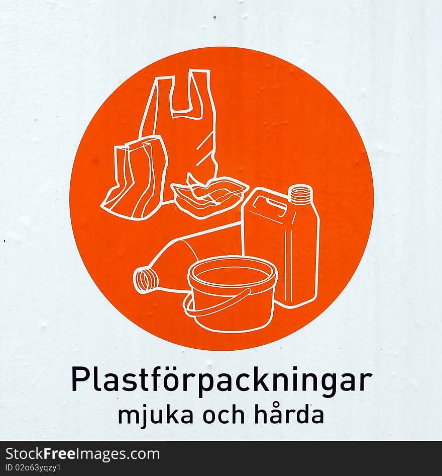 Recycling sign in orange colour