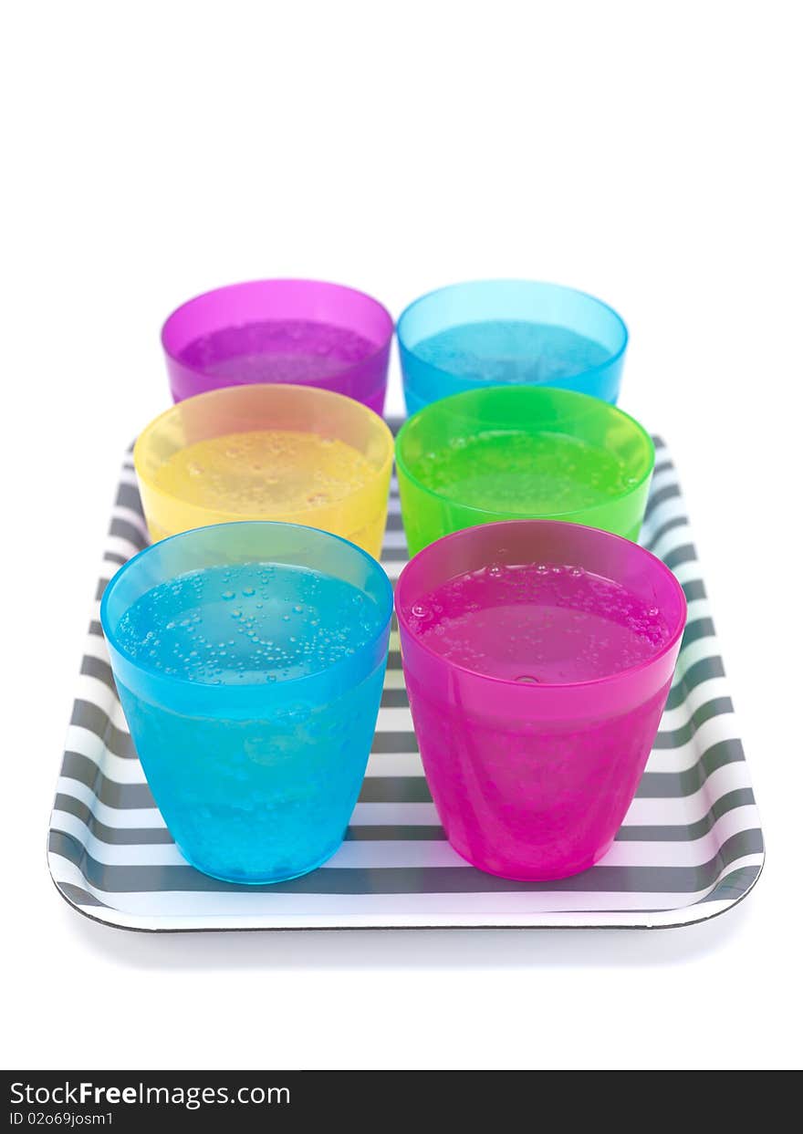 Drinks on a serving tray isolated against a white background. Drinks on a serving tray isolated against a white background