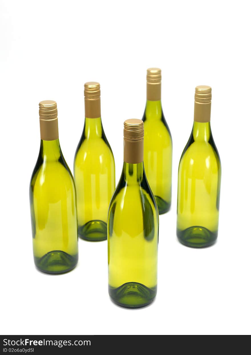 Bottles of white wine isolated against a white background