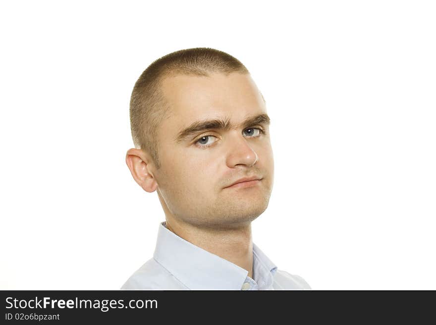 Young man from a businessman in a blue shirt on a white background. Young man from a businessman in a blue shirt on a white background