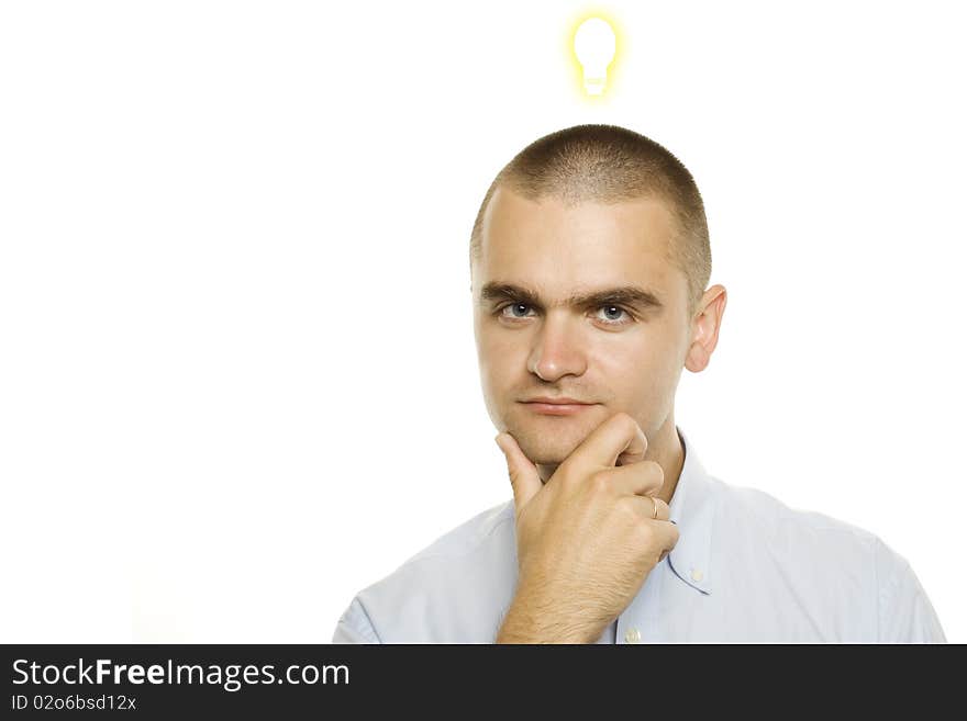 Portrait of a young businessman, inspired by the idea. Above his head painted lamp. Portrait of a young businessman, inspired by the idea. Above his head painted lamp