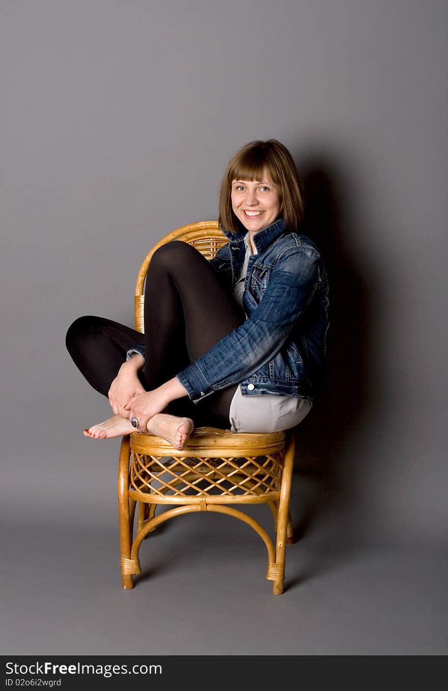 Attractive girl  on chair