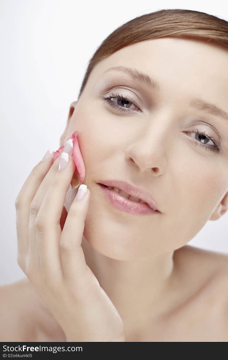 Portrait of woman with flower petal. Portrait of woman with flower petal