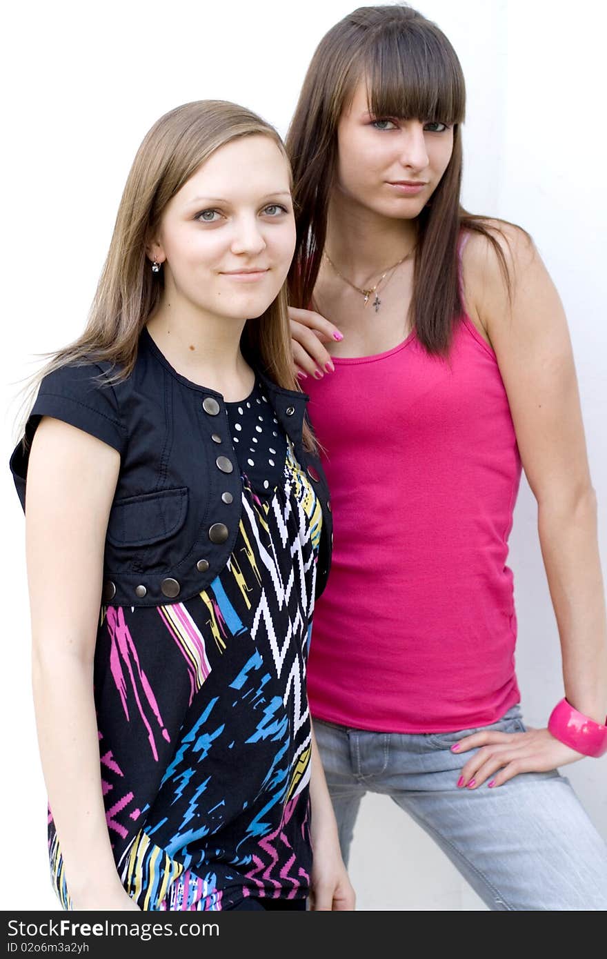 Two female friends posing outdoor