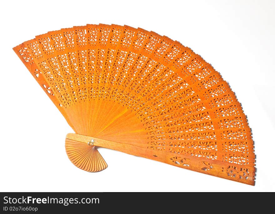 Brown wooden fan with beautiful pattern texture