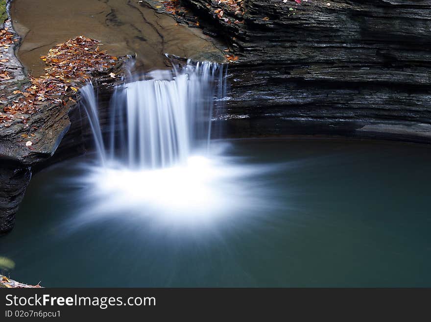 Simple waterfall at the beginning of the trail. Simple waterfall at the beginning of the trail.