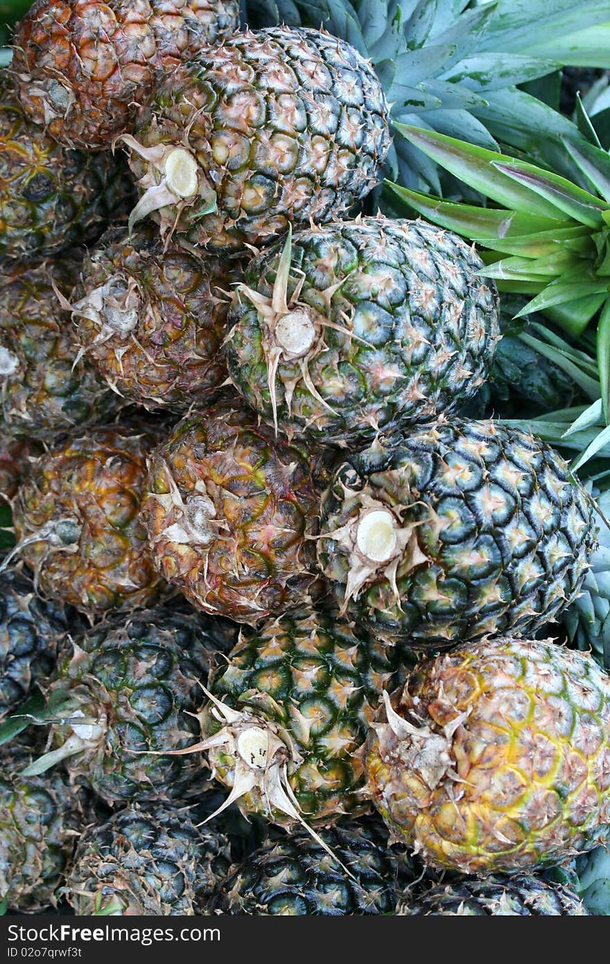 Pineapples in a Philippine fruit stand