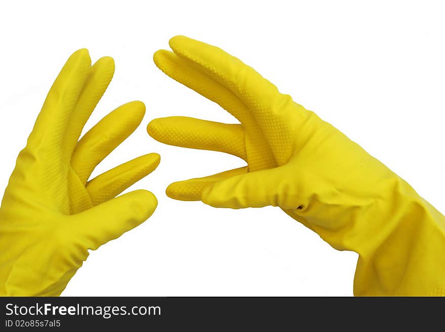 A pair of yellow rubber gloves on hands