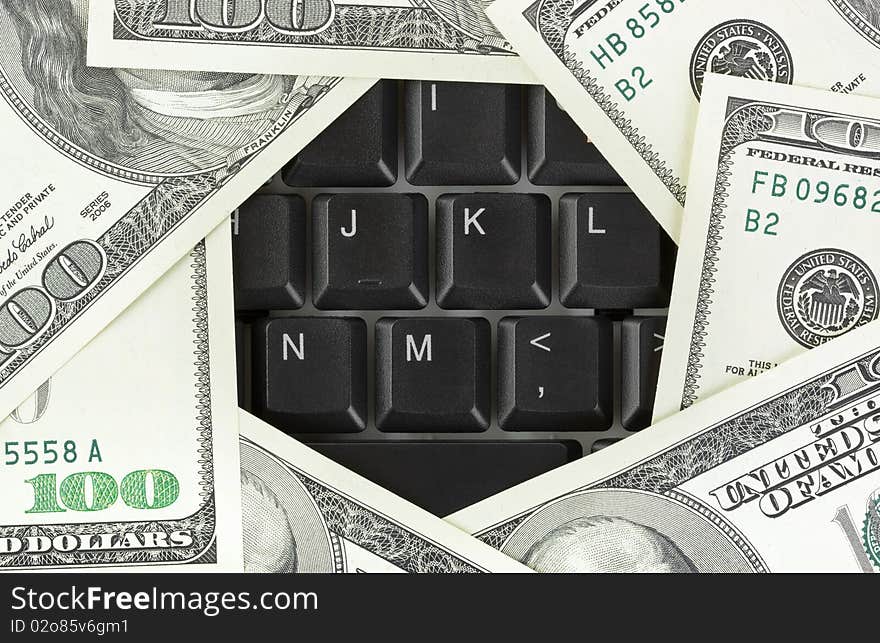 Computer keyboard and money - concept business background