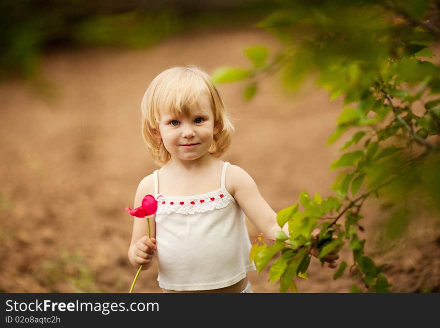 Happy Girl With Tulip