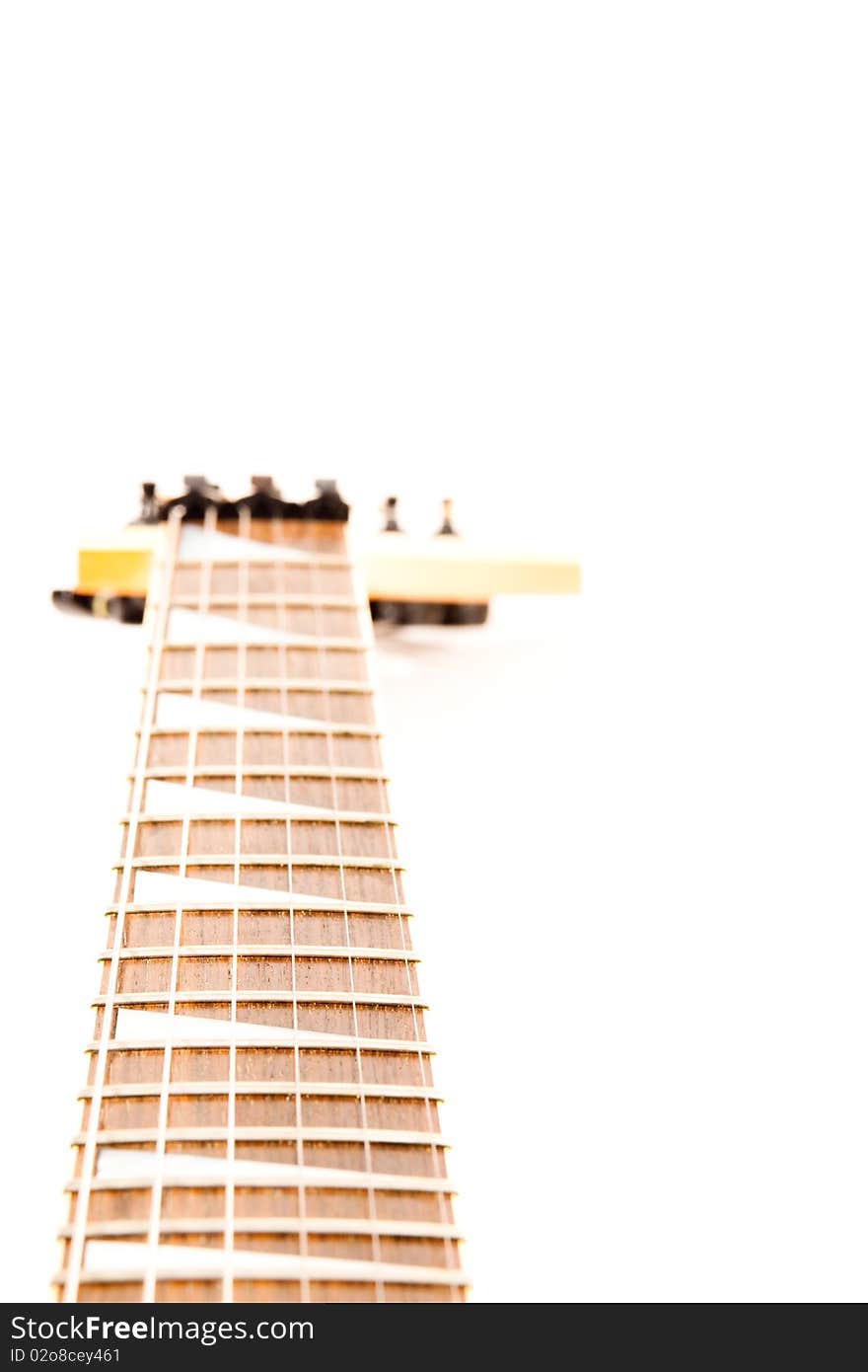 A six string electric guitar isolated on a white