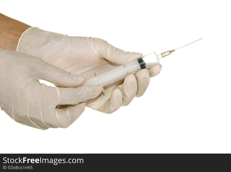 Syringe in his hand on a white background