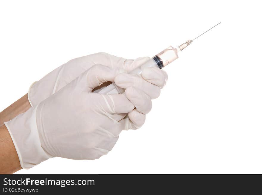 Syringe in his hand on a white background