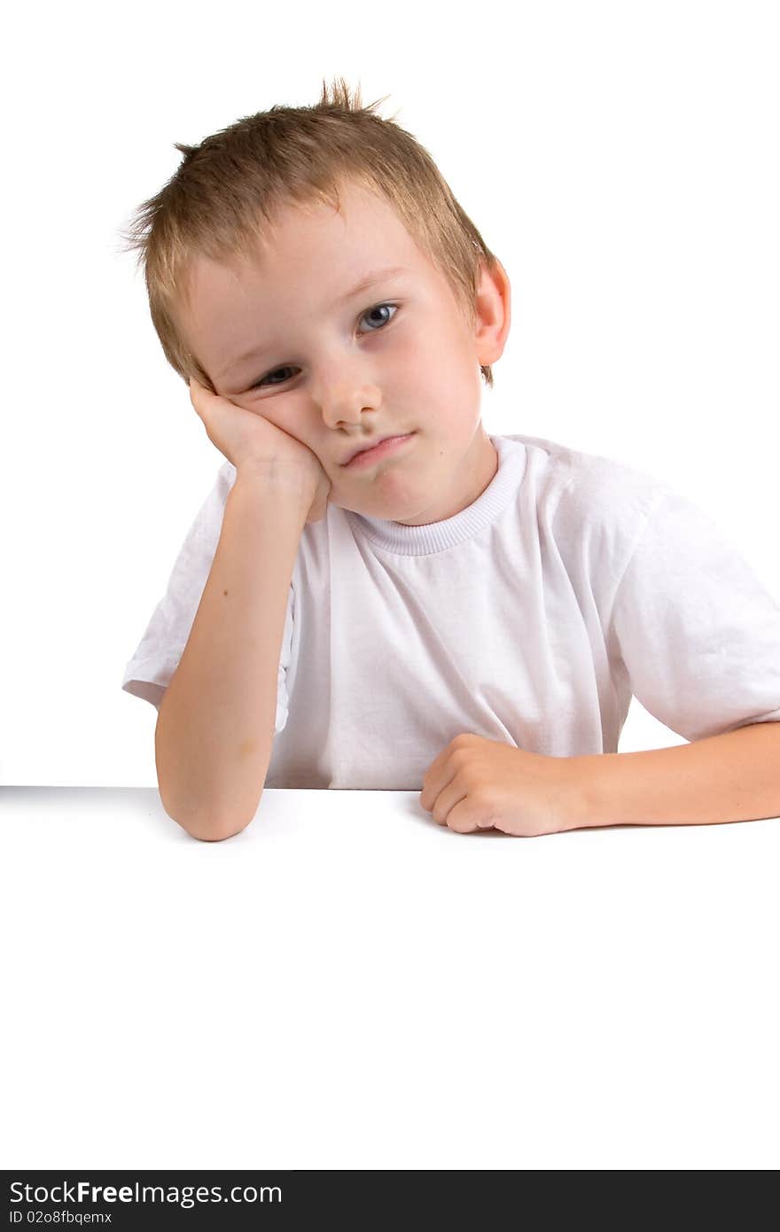 Portrait of a pensive boy on a white background. Portrait of a pensive boy on a white background