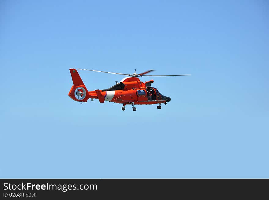 A rescue helicopter against the blue sky