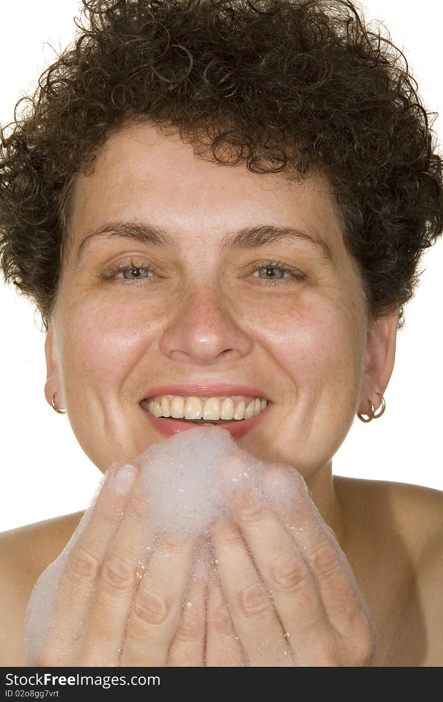 Woman on a white background washes foam. Woman on a white background washes foam