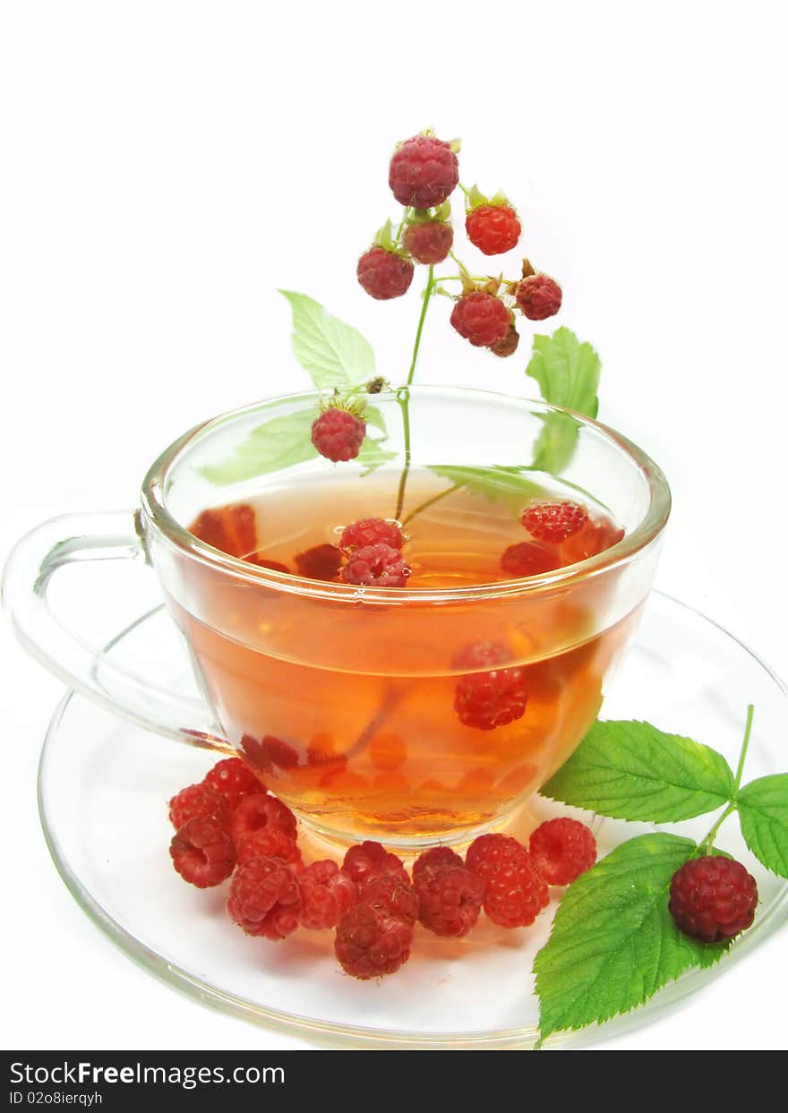 Raspberry red tea with fresh berries. Raspberry red tea with fresh berries