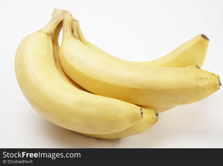 Close-up fresh bunch of bananas isolated on white background