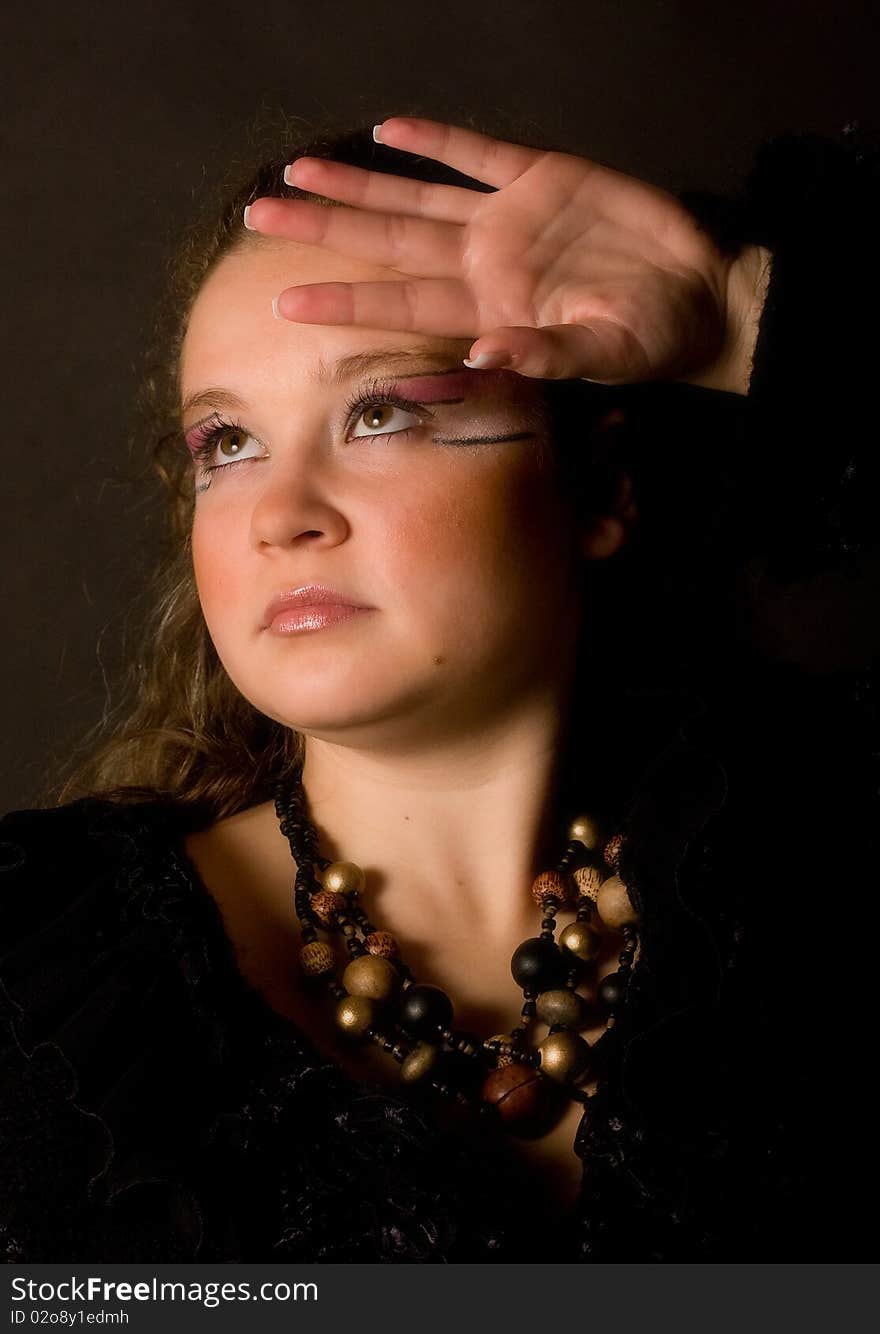 Nice girl with palm against the light. Nice girl with palm against the light