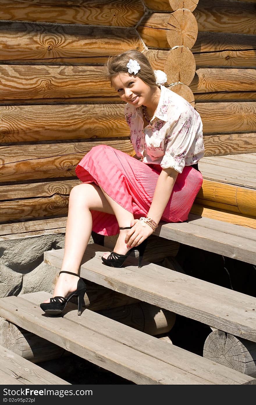 Girl on a veranda