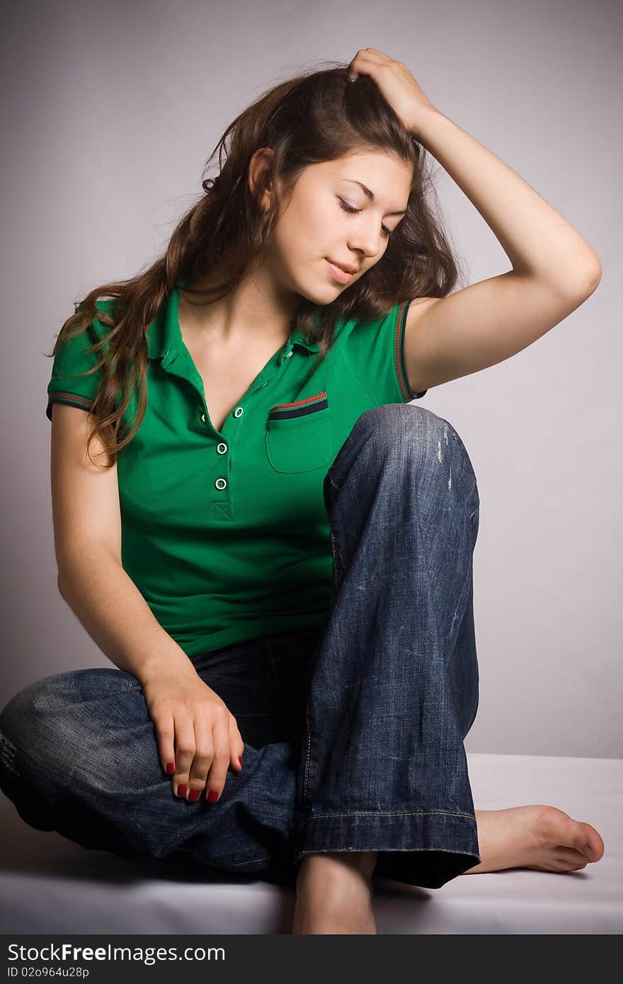 Beautiful Young Woman Sitting