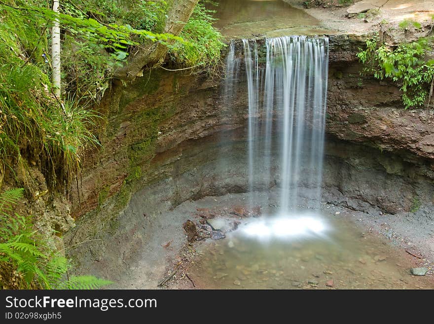 Deep waterfall in the forest