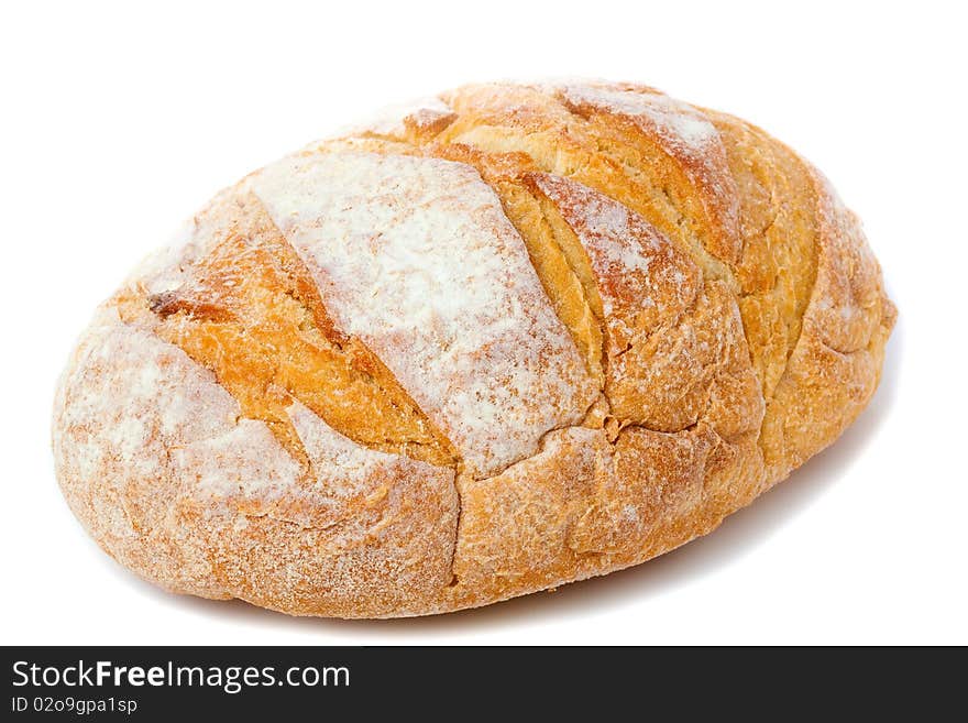 Whole farmhouse type loaf on a white background. Whole farmhouse type loaf on a white background